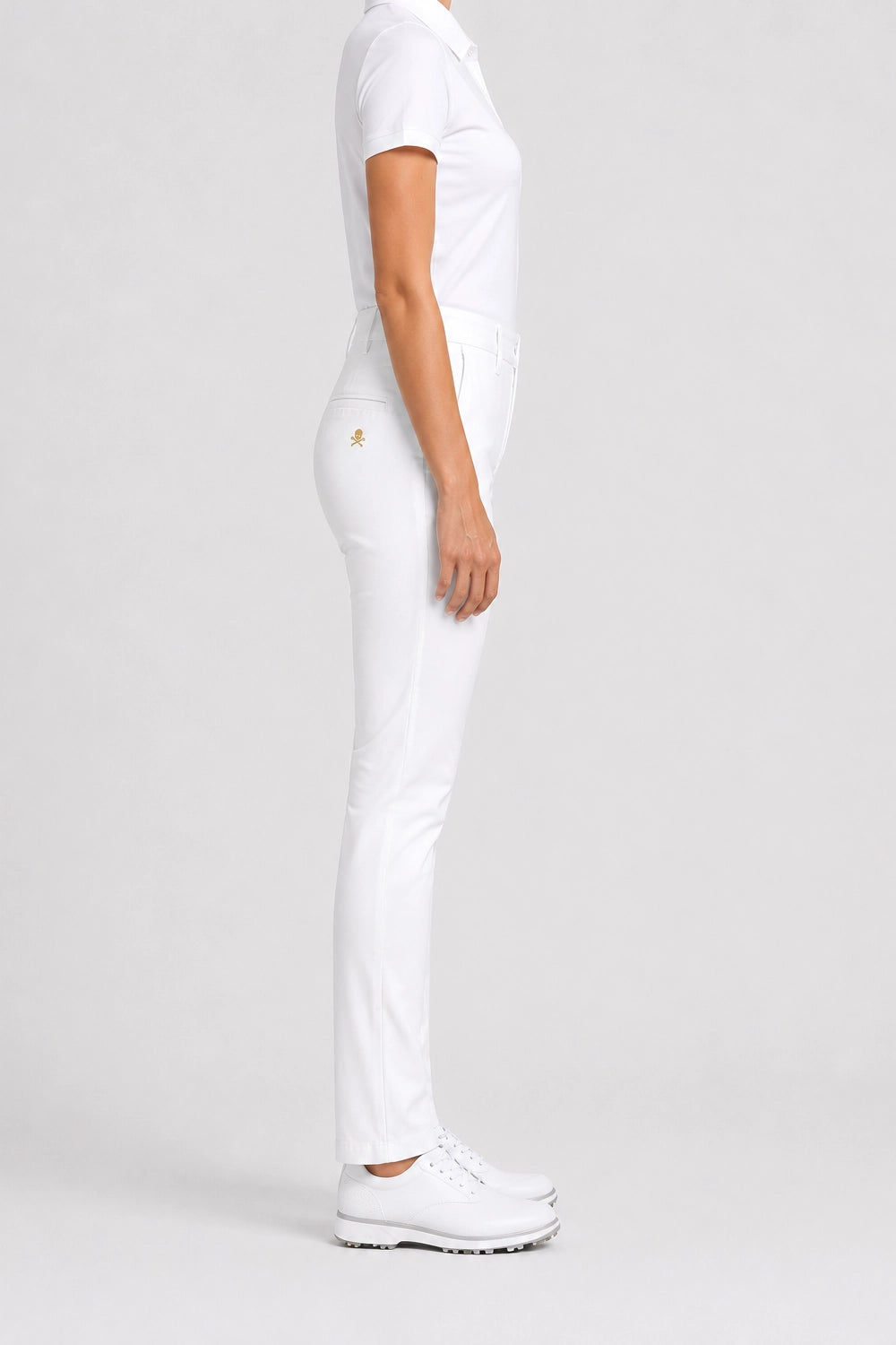Pantalon de golf chino blanc pour femme, coupe droite, poches et passants.