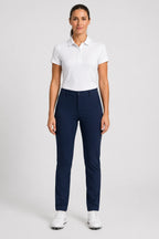 Pantalon de golf femme bleu marine, tenue complète, taille boutonnée et poches.