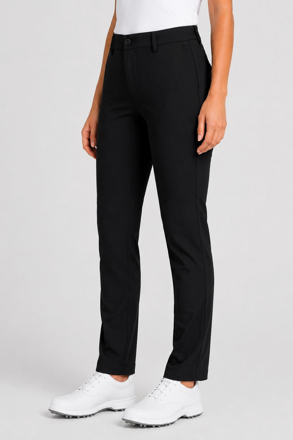 Pantalon de golf femme noir, fermeture boutonnée et poches, coupe droite.