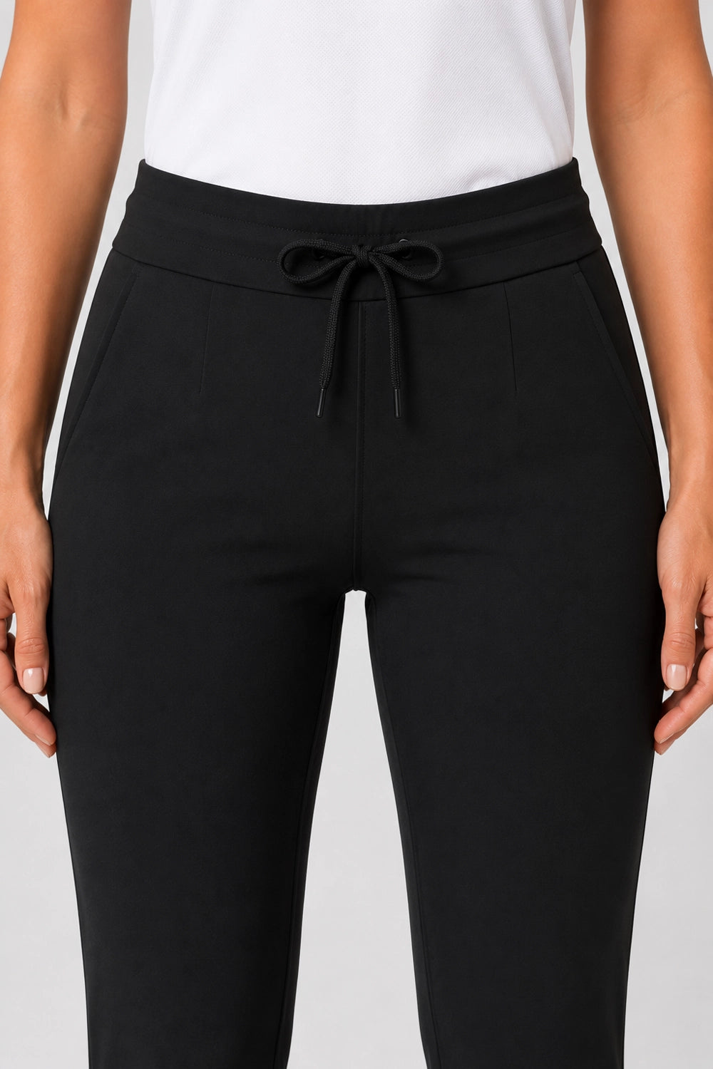 Pantalon de golf stretch femme noir, cordon de serrage et couture frontale