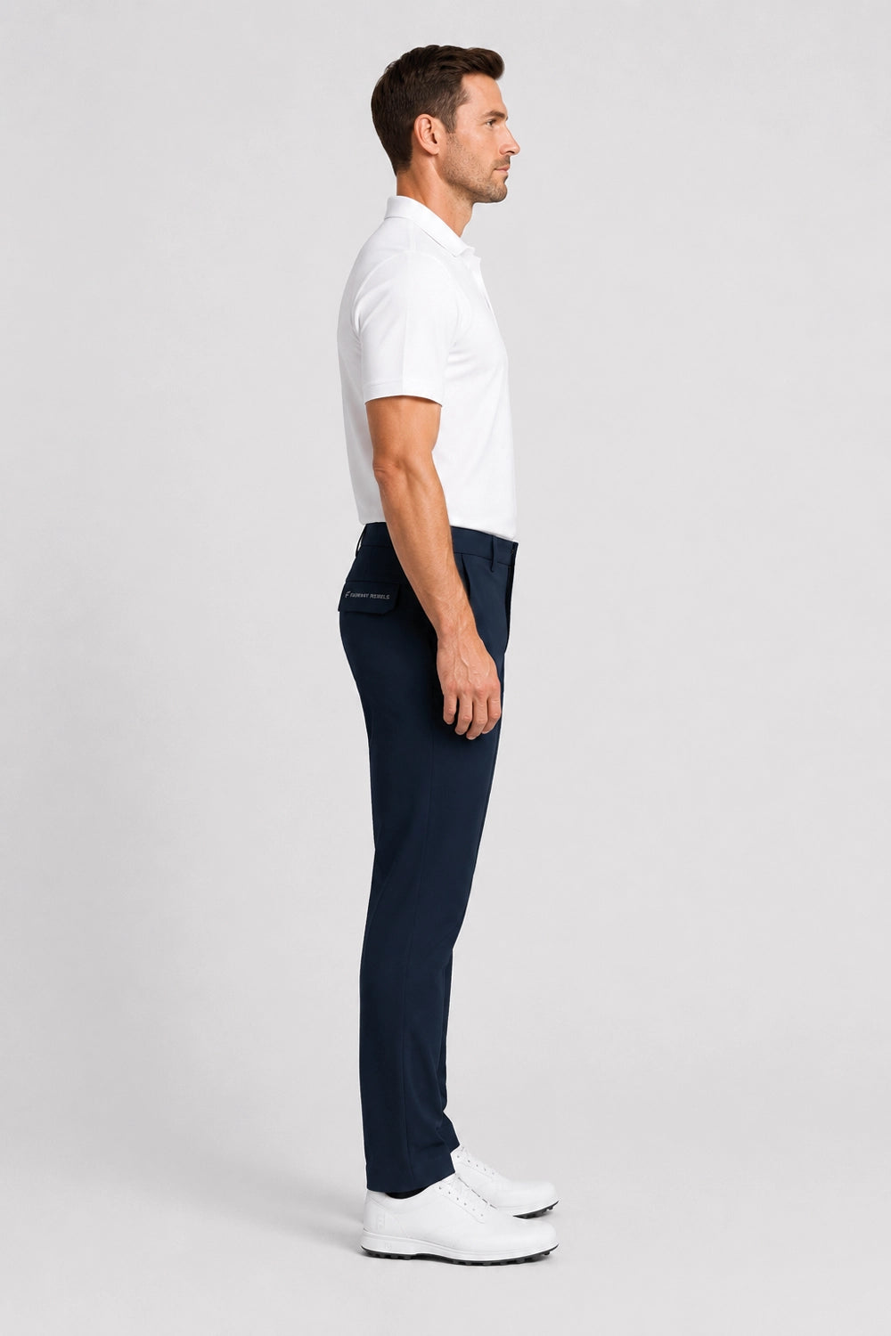 Pantalon de golf déperlant bleu marine homme, vue de profil, jambes droites et passants