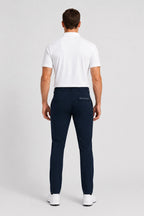 Pantalon de golf déperlant bleu marine homme, vue de dos, fermeture ceinture et pinces