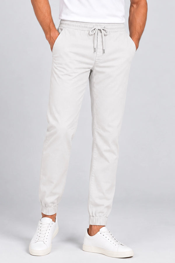 Pantalon de golf homme ivoire, taille élastique à cordon, bas resserré.