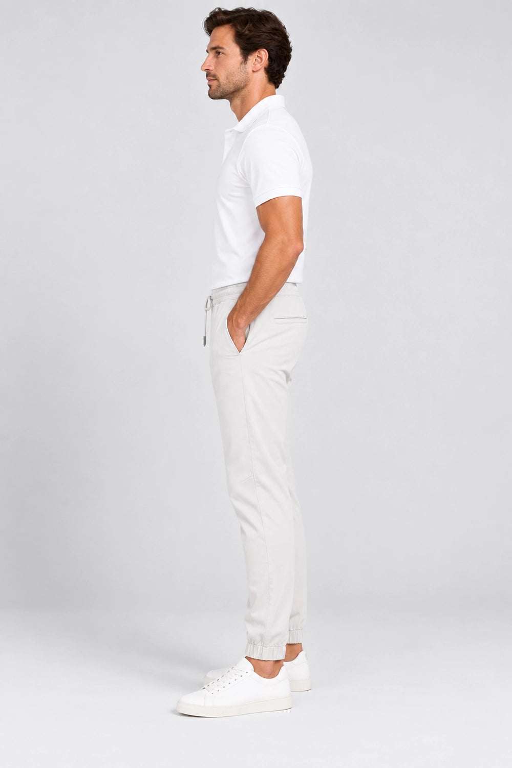 Pantalon de golf homme ivoire, coupe jogging, cordon à la taille, ourlet resserré.