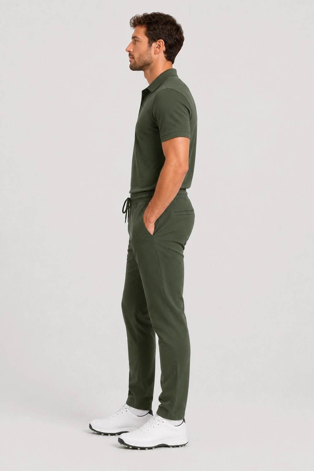 Pantalon de golf Flex vert, vue de profil, cordon de serrage à la taille.
