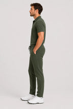 Pantalon de golf Flex vert, vue de profil, cordon de serrage à la taille.