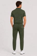 Pantalon de golf Flex vert, vue de dos, cordon à la taille, jambes droites.