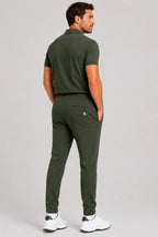 Pantalon de golf homme vert vue arrière, taille élastique à cordon, logo discret