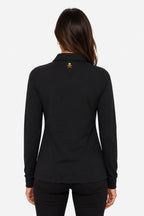 Polo manches longues noir au dos, col en pointe, petite broderie logo sur l’arrière.