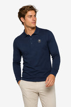 Polo de golf homme coton bleu marine, col polo boutonné, logo sur la poitrine.
