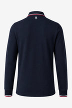 Polo manches longues coton bleu marine, col à liseré rouge et blanc, logo dos.