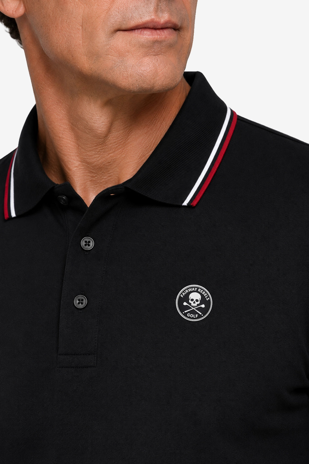 Polo noir manches longues : col rayé rouge et blanc, boutons, logo rond poitrine.