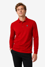 Polo manches longues en coton rouge, col boutonné et écusson poitrine.