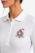 Polo manches longues blanc à col boutonné, logo «Fairy Rebels» brodé sur la poitrine