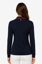 Polo femme manches longues en coton bleu marine, col et poignets à liseré.