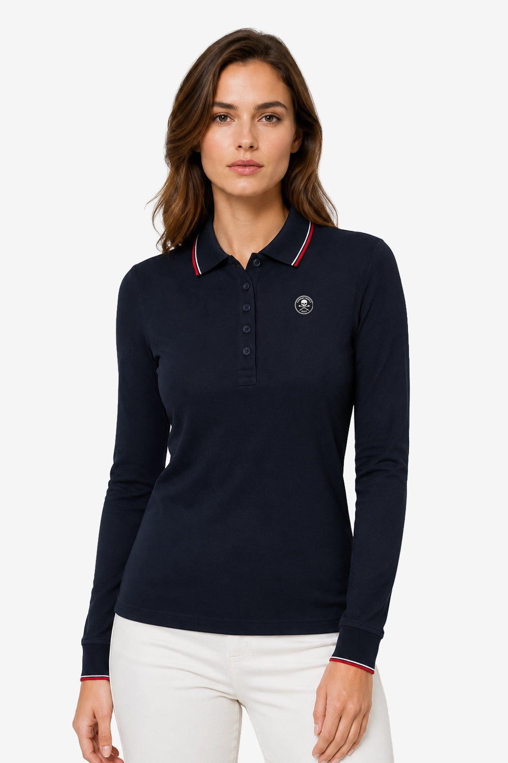 Polo femme manches longues en coton bleu marine avec écusson poitrine et liseré au col.