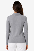 Polo manches longues femme en coton gris, fermeture boutonnée et col polo.