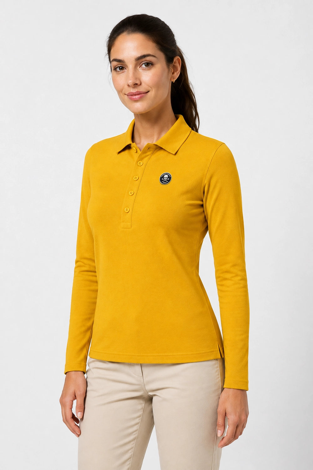 Polo manches longues femme en coton jaune, col polo boutonné et écusson poitrine.