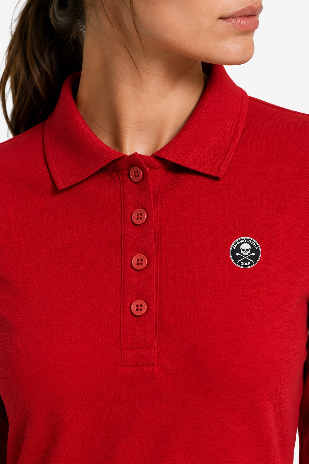 Polo golf femme manches longues en coton rouge, col et patte boutonnée, logo poitrine