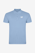 Polo fille en coton bleu ciel, manches courtes, badge sur la poitrine, patte boutonnée
