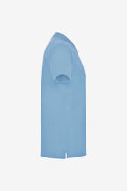 Polo fille en coton bleu ciel, manches courtes, col avec patte boutonnée