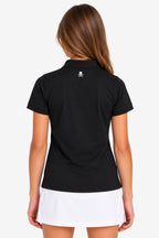 Polo technique noir fille, vue dos, col avec patte, petit logo central sur le haut du dos.