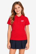 Polo technique golf fille rouge, col boutonné, logo poitrine, coupe ajustée.