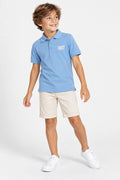 Polo garçon bleu ciel en coton, manches courtes, col et boutons, logo poitrine