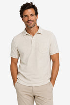 Polo de golf pour homme beige clair en jersey à col boutonné, poche poitrine.