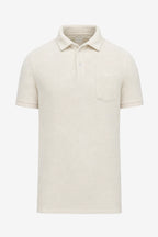 Polo de golf pour homme beige clair uni, col boutonné, poche poitrine, manches courtes.