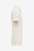 Polo de golf pour homme beige clair, vue de profil : manche courte et col.