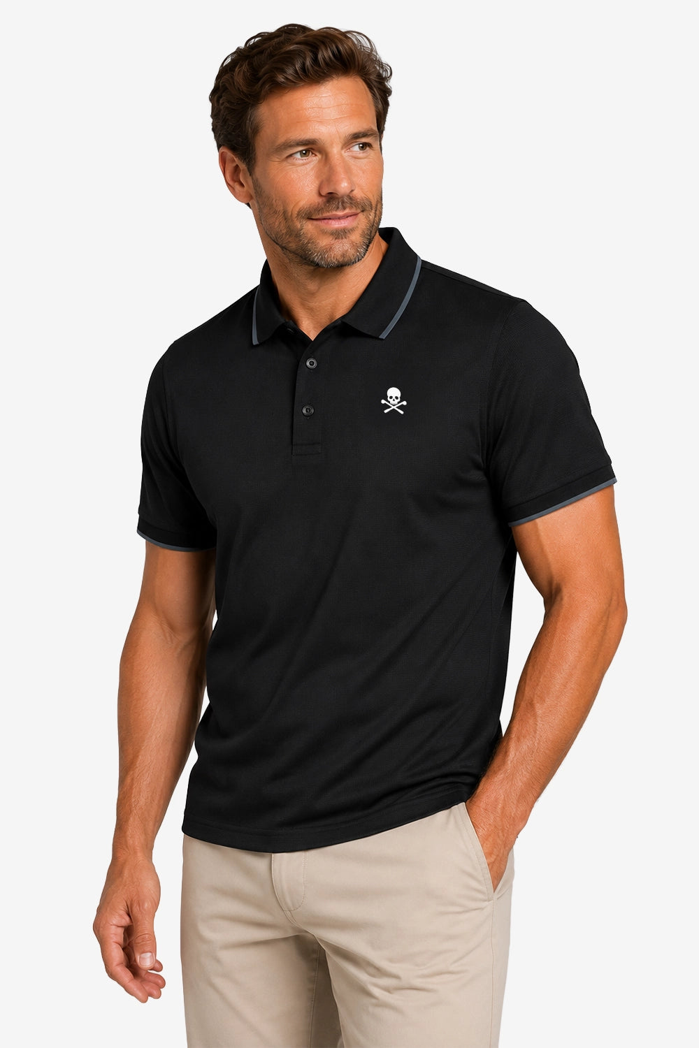 Polo de golf homme gaufré stretch noir, col polo boutonné, logo crâne sur la poitrine