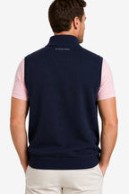 Gilet golf zippé sans manches bleu marine à l’arrière, bord côte bas, logo dos.