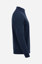 Pull golf technique bleu marine manches longues, vue trois-quarts