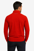 Pull de golf homme rouge à demi-zip, col montant, dos avec logo discret