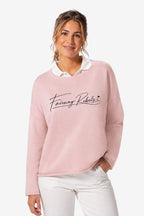 Sweat de golf femme ample rose, col blanc et logo « Fairway Rebels ».