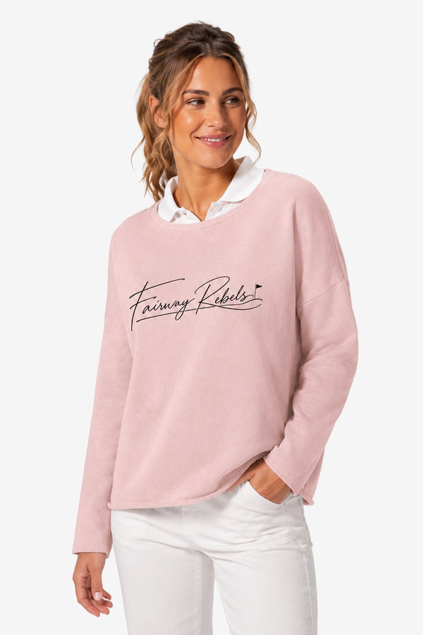 Sweat de golf femme ample rose, logo « Fairway Rebels » et manches longues.