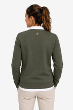 Sweat de golf femme vert foncé, vue de dos, petit logo poitrine.