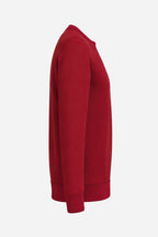Sweat-shirt de golf femme bordeaux, vue de côté, manches longues et ourlet.