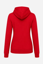 Sweat à capuche femme rouge, vue de dos : capuche structurée, bas côtelé et coutures visibles.
