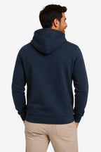 Sweat à capuche homme bleu marine, vue arrière, capuche et coutures visibles.