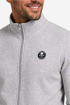 Veste de golf zippée gris clair, détail du logo rond sur la poitrine