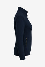 Veste de golf déperlante bleu marine, poche zippée sur la manche.