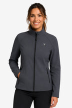 Veste de golf déperlante pour femme bleu marine, zip intégral, col montant, poches discrètes.