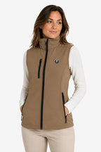 Veste golf femme sans manches déperlante beige, zip central, col montant et poches latérales.