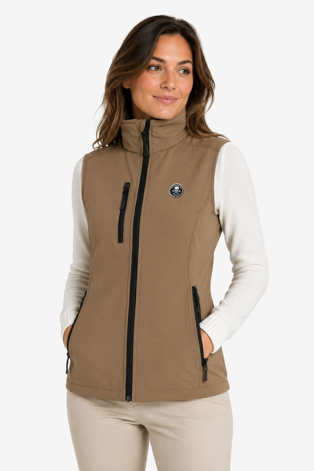Veste golf femme sans manches déperlante beige, zip central, col montant et poches latérales.