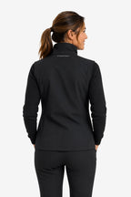 Veste de golf noire, vue arrière, capuche et zip central visibles, manches longues