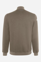 Veste de golf homme beige, vue dos avec manches côtelées et écusson