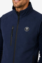 Veste golf sans manches déperlante bleu marine, détail zip central et logo poitrine