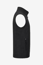 Gilet sans manches noir, vue de profil, poche verticale zippée et fermeture centrale